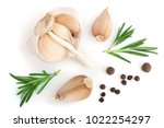 garlic with rosemary and peppercorn isolated on white background. Top view. Flat lay pattern