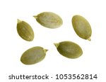 Pumpkin seeds or pepitas, isolated on white background. Top view. Flat lay.