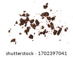 Small photo of grated chocolate isolated on white background. Top view