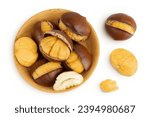 roasted peeled chestnut in wooden bowl isolated on white background. Top view. Flat lay