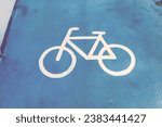 Road sign bicycle path on the road,Traffic sign for exclusive lane for bicycles in the city,bicycle sign on asphalt,Bicycle path, road marking element with graphic bicycle sign,Space for text.