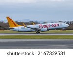 Small photo of Manchester, UK. March, 17 2022: A Pegasus Airlines Boeing 737-800 taking off from Manchester Airport