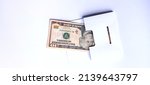 Small photo of 10 ten dollars gift bill in my pocket white fullscreen