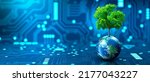Small photo of Tree growing on Earth with abstract blue background. Environmental Technology, Earth day, Energy saving, Environmentally friendly, csr, and IT ethics Concept. Elements furnished by NASA.