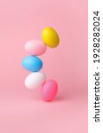 colorful easter eggs balancing... | Shutterstock . vector #1928282024