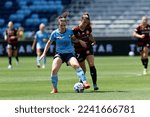 Small photo of Amy Harrison of Wanderers competes for the ball with Natalie Tobin of Sydney FC during the match between Sydney FC and Wanderers at Allianz Stadium on December 24, 2022 in Sydney, Australia