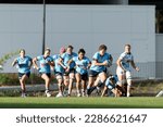 Small photo of Bridie O’Gorman of the Waratahs runs with the ball during the Buildcorp Super W match between the Waratahs and the Drua at Concord Oval on April 8, 2023 in Sydney, Australia