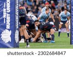 Small photo of Ryan Louwrens of the Rebels prepares to pass the ball during the Super Rugby Pacific match between the Waratahs and the Rebels at Allianz Stadium on May 13, 2023 in Sydney, Australia