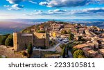 Small photo of View of Montalcino town, Tuscany, Italy. The town takes its name from a variety of oak tree that once covered the terrain. View of the medieval Italian town of Montalcino. Tuscany