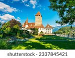Small photo of View of Spiez Church and Castle on the shore of Lake Thun in the Swiss canton of Bern at sunset, Spiez, Switzerland. Spiez Castle on lake Thun in the canton of Bern, Switzerland.