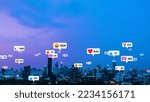 Small photo of Social media icons fly over city downtown showing people reciprocity connection through social network application platform . Concept for online community and social media marketing strategy .