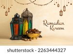 Small photo of Ramadan background design colourful lantern lamp with dates and tasbih isolated on beige background, Islamic concept Ramadan and Eid Mubarak image