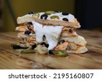 Delicious Double Decker Pizza Sandwich with jalapenos,  mushrooms and Cheese topping