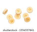 Many banana slices falling, isolated on white background with clipping path. Studio shoot.
