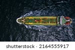 Small photo of Aerial top view oil tanker petrochemical tanker transfer crude oil to oil refinery, Global business logistic industrial crude oil and fuel tanker ship.