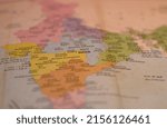 Small photo of A colorful physical map showing Indian states written in English Hindi