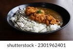 Small photo of Chicken Katsu Curry is a meal crispy chicken chunks served over rice with Japanese curry sauce.