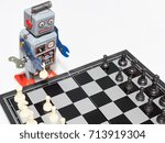Toy robot Playing chess / artificially intelligent robot