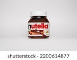 Small photo of Jakarta, Indonesia - September 2nd, 2022: Nutella Hazelnut Cocoa Spread Jar isolated with white background. Infamous and delicious chocolate spread jar.
