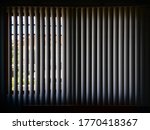Vertical Blind Curtain. Behind...