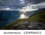 Small photo of Beautiful sun beam in the Aurlandfjord from Prest viewpoint in stunning mountain scenery Norway