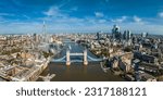 Small photo of Aerial view of the Tower Bridge in London. One of London's most famous bridges and must-see landmarks in London. Beautiful panorama of London Tower Bridge.