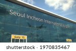 Airliner take off reflecting in the windows with seoul incheon international airport text 3D rendering