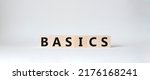 Basics symbol. Concept word Basics on wooden cubes. Beautiful white background. Business and Basics concept. Copy space.