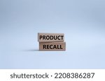 Small photo of Product recall symbol. Concept words Product recall on wooden blocks. Beautiful white background. Business and Product recall concept. Copy space.