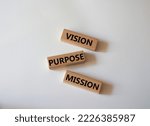 Small photo of Vision Purpose Mission symbol. Concept word Vision Purpose Mission on wooden blocks. Beautiful white background. Business and Vision Purpose Mission concept. Copy space.