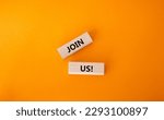 Small photo of Join us symbol. Concept word Join us on wooden blocks. Beautiful orange background. Business and Join us concept. Copy space