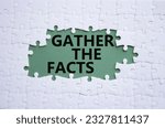 Small photo of Gather the facts symbol. White puzzle with words Gather the facts. Beautiful grey green background. Business and Gather the facts concept. Copy space.