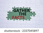 Small photo of Gather the facts symbol. White puzzle with words Gather the facts. Beautiful grey green background. Business and Gather the facts concept. Copy space. Conceptual word