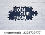 Small photo of Join our team symbol. Concept words Join our team on white puzzle. Beautiful deep blue background. Business and Join our team concept. Copy space.