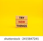 Small photo of Try new Things symbol. Concept words Try new Things on wooden blocks. Beautiful yellow background. Business and Try new Things concept. Copy space.