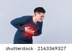 Small photo of Man with chest pain isolated, man with tachycardia, Man with heart pain on isolated background, young man with chest pain isolated