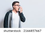 Small photo of Handsome man with bad breath and halitosis problem, People with bad breath problem, Concept of person with halitosis and bad breath