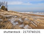 The sandy beach and winter shoreline as seen at Point Beach State Forest on Lake Michigan, Two Rivers, Wsconsin.