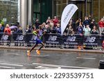 Small photo of London, UK - April 23 2023: Sir Mo Farah running London Marathon 2023 at Canary Wharf.
