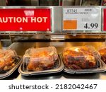Small photo of Riverhead, New York, USA - July 24, 2022: Costco rotisserie chickens, which the wholesale retailer famously sells for only $5, are seen on display at a location in Riverhead, New York.