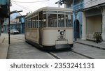 Small photo of Yogyakarta, Indonesia - August 24, 2023: A tramcar at the tourist attraction named Gamplong Natural Studio.