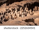Small photo of Xi'An,ShaanxiChina-Jan 16 2023 :The Terracotta Army or the "Terra Cotta Warriors and Horses" buried in the pits next to the Qin Shi Huang's tomb in 210-209 BC.