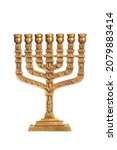 Small photo of Hanukkah candlestick isolated on white. Ancient ritual candle menorah close up on a white background. Hanukkah festive attribute. Ritual item. The Menorah is the oldest symbol of Judaism.