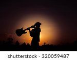 guitarist silhouette | Shutterstock . vector #320059487