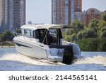 Luxury motorboat floating on...