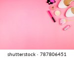 Beautiful flatlay with white flats,  tulip, cosmetics and other accessories on pink background with copyspace