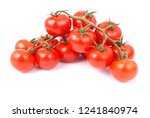 Cherry tomatoes on branch isolated on white background