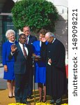 Small photo of Washington DC. USA, October 18, 1991 Judge Clarence Thomas is sworn as Associate Justice of the United States Supreme Court by Justice Bryon White at White House as his wife Virginia holds the Bible