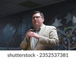 Small photo of TOPEKA, KANSAS, USA - AUGUST 19, 2023 Congressman Jake LaTurner speaking to constituents at the Topeka North American Legion Hall during the annual summer picnic for the 2nd congressional district