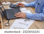 Man at work at desk, accountant